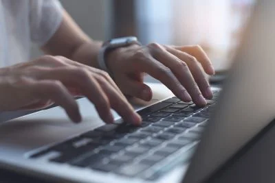 Provider on laptop hands